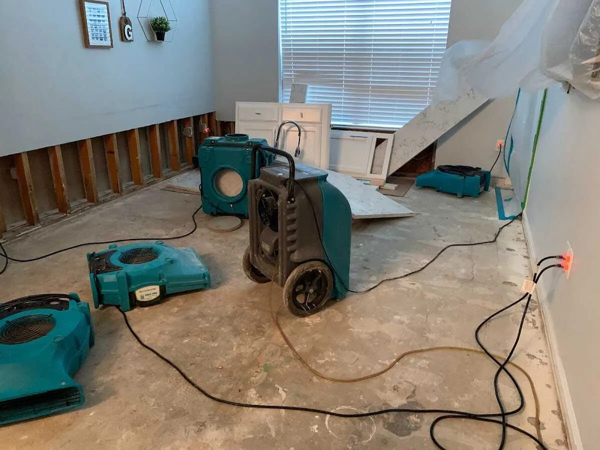 Dehumidifier in flood-cut room for Water Damage Restoration in New Castle